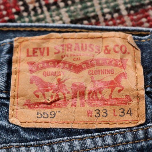 Levi's 559 W34 L31 Straight Leg Relaxed Fit Classic Ripped Style Blue Denim Jean