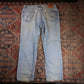 Levi's W42 L31 Tapered Leg Loose Fit Classic Ripped Style Blue Denim Jeans