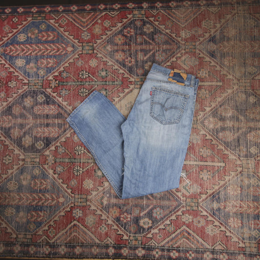 Levi's W34 L30 Straight Leg Loose Fit Classic Ripped Style Blue Denim Jeans